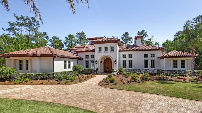 Urban Meyer house Tim Tebow neighbor