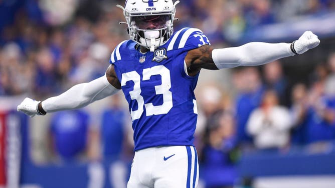 Indianapolis Colts returner Dallis Flowers signals as the opening kickoff goes out of the back of the endzone during the NFL game between the Jacksonville Jaguars and the Indianapolis Colts on September 10, 2023, at Lucas Oil Stadium in Indianapolis, Indiana.
