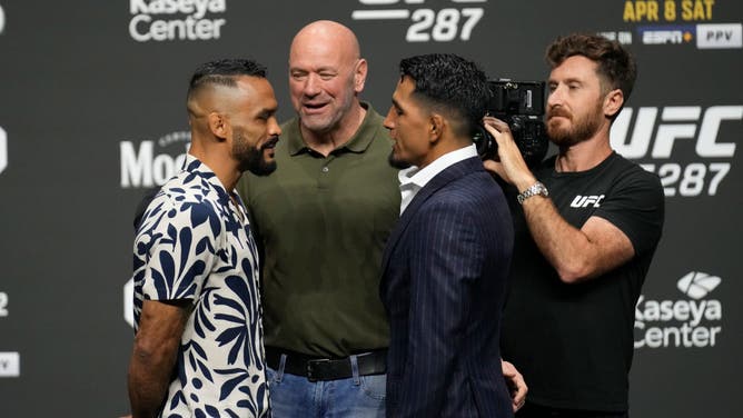 Rob Font and Adrian Yanez face off during a press conference for UFC 287 at Kaseya Center in Miami.