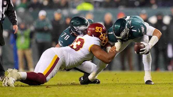 Washington Football Team DT Jonathan Allen sacks Philadelphia Eagles QBJalen Hurts at Lincoln Financial Field in Philadelphia.