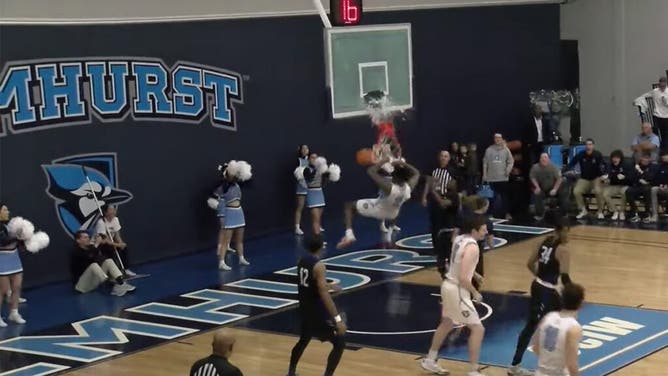 elmhurst-basketball-slam-dunk-backboard-shatter