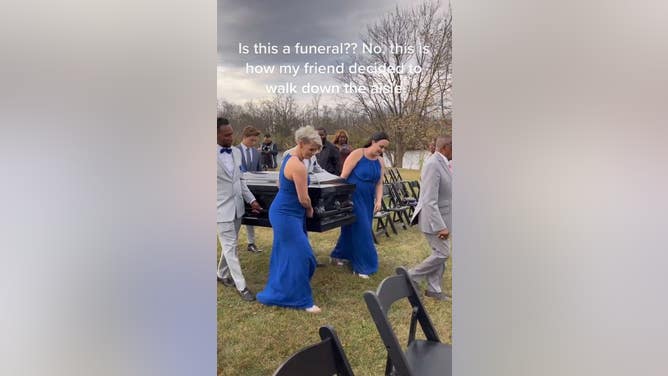 Groom Carried Down The Aisle In A Coffin