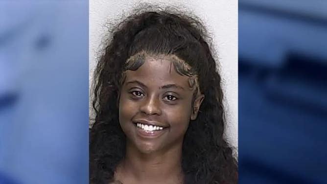 florida woman throws sasusage at casheir
