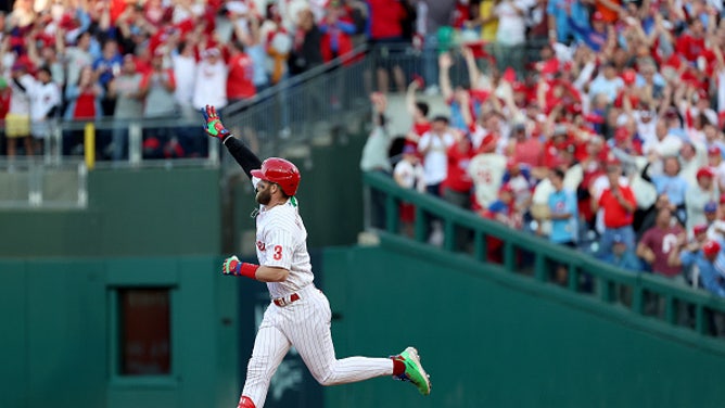 Bryce Harper's rounds the bases after a homer that came just two hitters after Rhys Hoskins took the Braves soul with an epic bat slam for the Phillies.