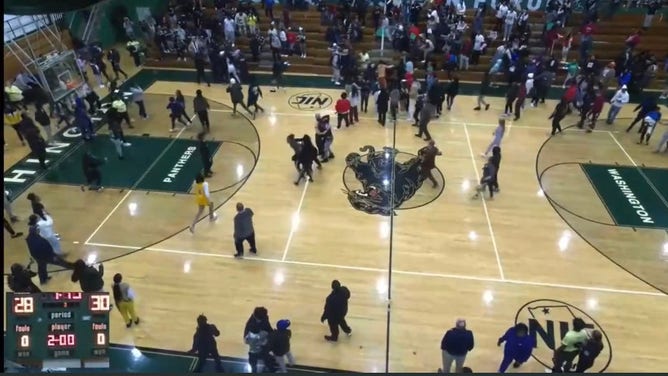 Indiana basketball game ends in fight.
