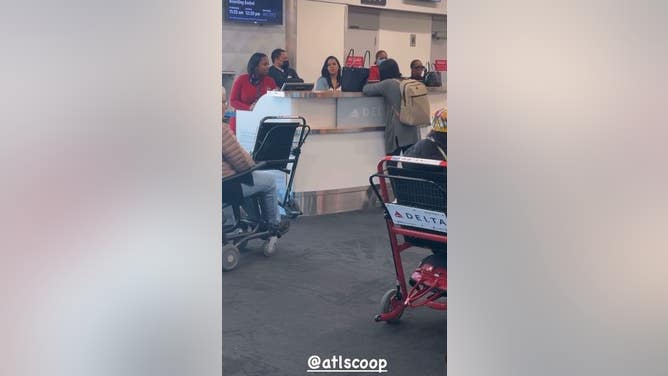 woman airport meltdown atlanta