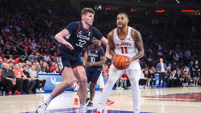 St. John's Red Storm C Joel Soriano gathers for a paint attempt against Connecticut Huskies C Donovan Clingan at Madison Square Garden. (Wendell Cruz-USA TODAY Sports)