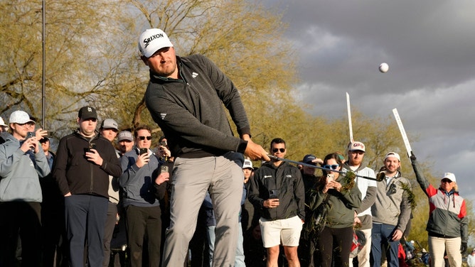 Andrew Novak chips onto the third green during the third round of the WM Phoenix Open. (Rob Schumacher/The Republic/USA TODAY)NETWORK