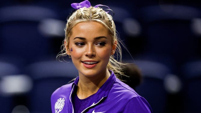 GAINESVILLE, FLORIDA - FEBRUARY 23: Olivia Dunne of the LSU Tigers looks on before a meet against the Florida Gators at the Stephen C. O'Connell Center on February 23, 2024 in Gainesville, Florida. (Photo by James Gilbert/Getty Images)