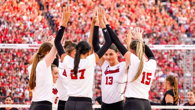 The Nebraska Cornhuskers huddle before the game against the Omaha Mavericks at Memorial Stadium.