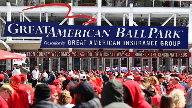 Cincinnati Reds fans line up outside Great American Ballpark prior to the team's Opening Day matchup against the Washington Nationals.