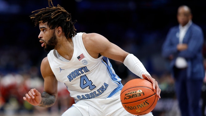 North Carolina Tar Heels guard RJ Davis dribbles the ball against the North Carolina State Wolfpack during the ACC Tournament Championship.