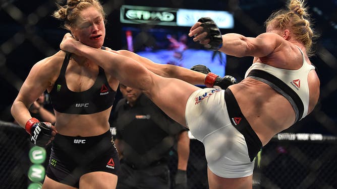 Holly Holm crushed Ronday Rousey. (Photo credit: PAUL CROCK/AFP via Getty Images)