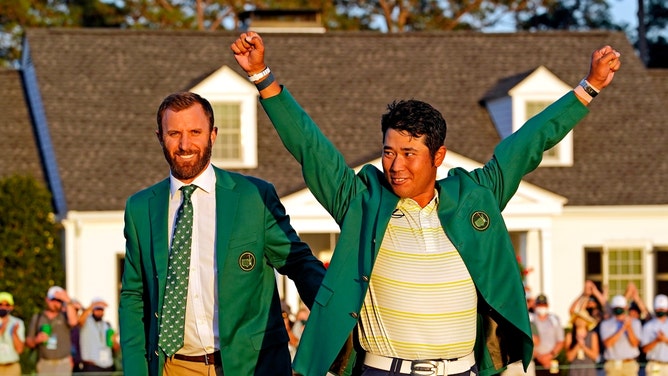 Dustin Johnson presents Hideki Matsuyama with the green jacket after The Masters 2021. (Rob Schumacher-USA TODAY Sports)