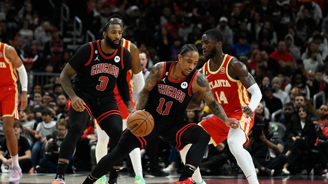 Chicago Bulls SF DeMar DeRozan dribbles attacks the paint on Atlanta Hawks SF AJ Griffin at the United Center in Illinois. (Matt Marton-USA TODAY Sports)