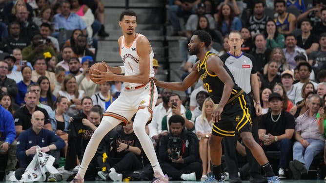 San Antonio Spurs C Victor Wembanyama posts up Golden State Warriors SF Andrew Wiggins at Frost Bank Center. (Daniel Dunn-USA TODAY Sports)