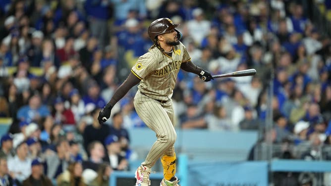 San Diego Padres OF Fernando Tatis Jr. hits a 2-run home run against the Los Angeles Dodgers. (Kirby Lee-USA TODAY Sports)