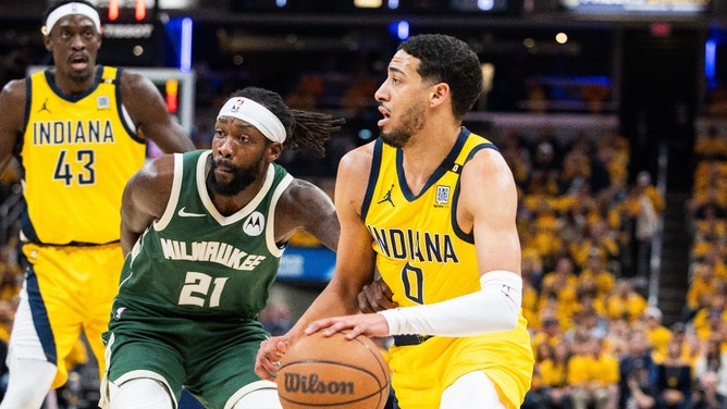 Pacers PG Tyrese Haliburton dribbles the ball while Milwaukee Bucks PG Patrick Beverley defends him in the 2024 NBA playoffs at Gainbridge Fieldhouse in Indiana. (Trevor Ruszkowski-USA TODAY Sports)