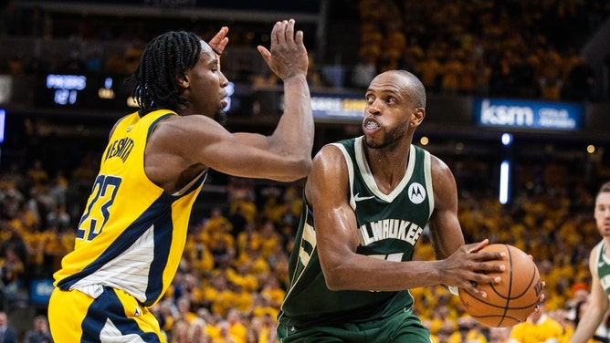 Milwaukee Bucks SF Khris Middleton gathers for a shot over Pacers SF Aaron Nesmith in Game 3 of Round 1 in the 2024 NBA Playoffs at Gainbridge Fieldhouse in Indiana. (Trevor Ruszkowski-USA TODAY Sports)