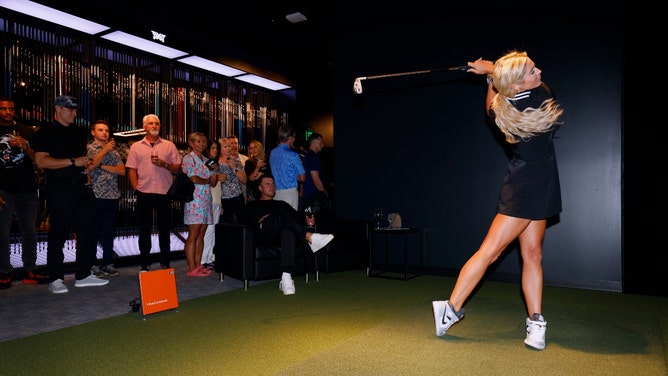 karin hart replicates paige spiranac's topless masters green jacket look