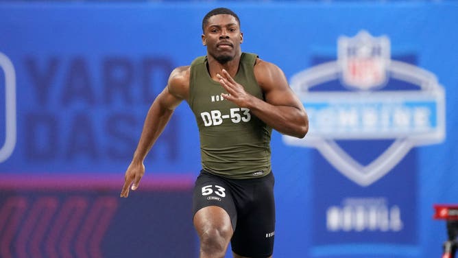 Defensive back Kamren Kinchens works out during the 2024 NFL Combine at Lucas Oil Stadium.