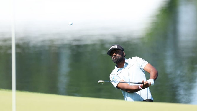 Sahith Theegala hits a chip shot on the 14th hole in Round 3 of the 2023 Wells Fargo Championship at Quail Hollow Country Club in Charlotte, North Carolina. (Mike Ehrmann/Getty Images)
