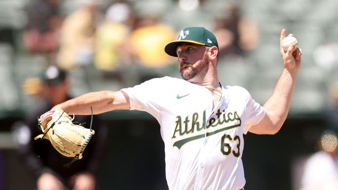 OAKLAND, CALIFORNIA - MAY 07: Hogan Harris #63 of the Oakland Athletics pitches against the Texas Rangers in the fourth inning at Oakland Coliseum on May 7, 2024 in Oakland, California. (Photo by Ezra Shaw/Getty Images)