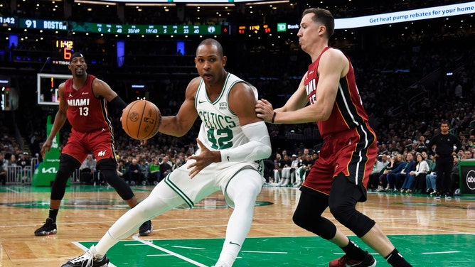 Boston Celtics C Al Horford posts up Miami Heat SG Duncan Robinson in Game 1 in the first round of the 2024 NBA playoffs at TD Garden. (Bob DeChiara-USA TODAY Sports)