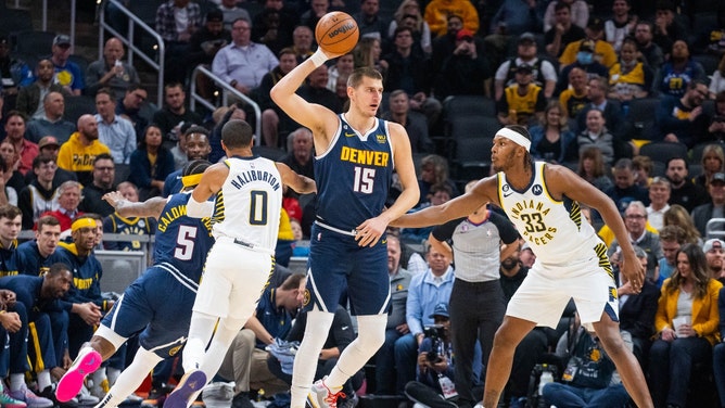 Denver Nuggets C Nikola Jokic looks to pass vs. the Indiana Pacers C Myles Turner at Gainbridge Fieldhouse. (Photo Credit: Trevor Ruszkowski-USA TODAY Sports)