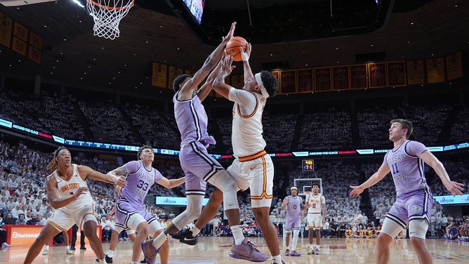 Kansas State Wildcats forward stuff David Iowa State Cyclones guard Tamin Lipsey in a Big XII game showdown at Hilton Coliseum. (Photo credit: Nirmalendu Majumdar/Ames Tribune-USA TODAY NETWORK via Imagn Images)