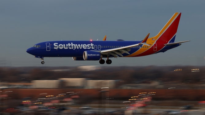 southwest airlines passenger naked and taking a dump