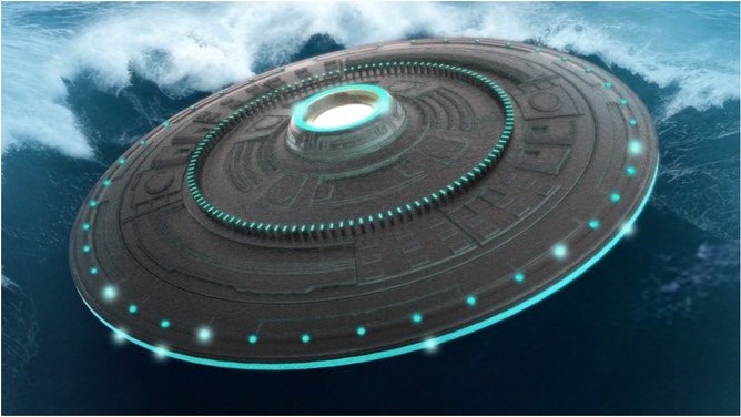 Newly released UFO footage filmed by the United States Navy appears to show something coming out of the water. Watch the video. (Credit: Getty Images Creative)