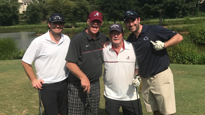 John Hayes, Rich Johnson, Larry Wallace and Dan Zaksheske during a round of golf at Chateau Elon.