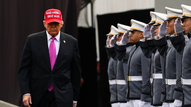 President Donald Trump talks about trophy wives during West Point commencement speech