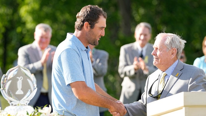 Scottie Scheffler shakes hands with Jack Nicklaus after winning the Memorial Tournament 2024 at Muirfield Village Golf Club in Dublin, Ohio. (Photo Credit: Adam Cairns-USA TODAY Sports)