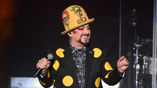 Boy George performs at a concert