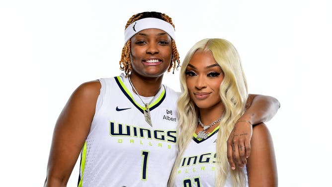 Just a few months after acquiring NaLyssa Smith from the Indiana Fever, the Dallas Wings have traded the forward, who is dating teammate DiJonai Carrington, to the Las Vegas Aces.