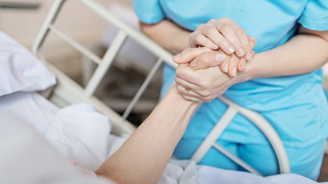 woman survives stabbing thanks to breast implants