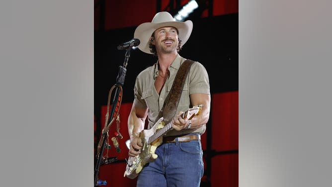NASHVILLE, TENNESSEE - JUNE 05: EDITORIAL USE ONLY. Riley Green performs on the main stage during CMA Fest 2025 at Nissan Stadium on June 05, 2025 in Nashville, Tennessee. (Photo by Jason Kempin/Getty Images)