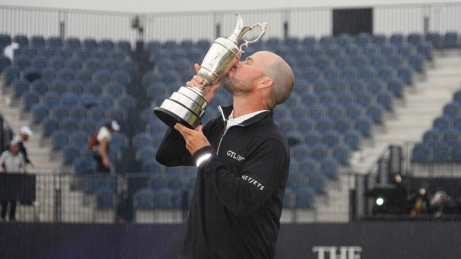 Brian Harman kisses the Claret Jug after winning The 2023 Open Championship at Royal Liverpool in England. (Photo credit: Kyle Terada-Imagn Images)