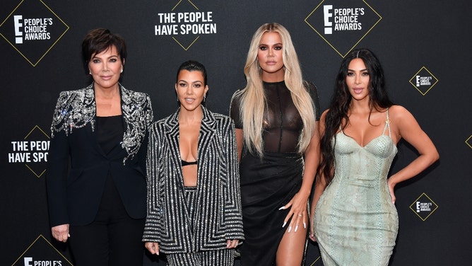 kourtney kardashian lingerie and nipple chain