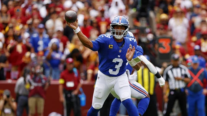 New York Giants quarterback Russell Wilson makes a pass during NFL Week 1 against the Washington Commanders.