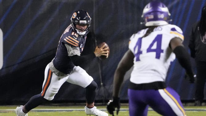 Chicago Bears quarterback Caleb Williams rushes the ball against the Minnesota Vikings during NFL Week 1.