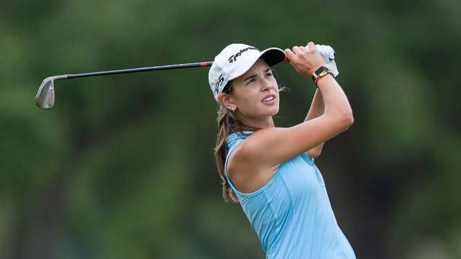 Kai Trump playing golf