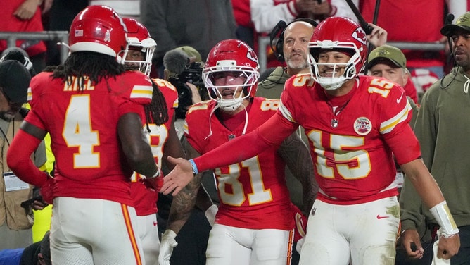 Kansas City Chiefs WR Rashee Rice celebrates with QB Patrick Mahomes after scoring a touchdown vs. the Washington Commanders at GEHA Field at Arrowhead Stadium in NFL Week 8. (Photo Credit: Denny Medley-Imagn Images)