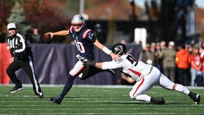 New England Patriots QB Drake Maye evading pressure by the Atlanta Falcons at Gillette Stadium. (Photo credit: Brian Fluharty-Imagn Images)