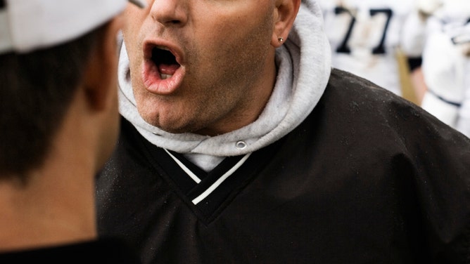 youth football fight with coach getting knocked out in Northern California