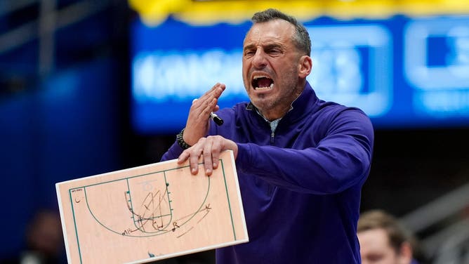 Green Bay head coach Doug Gottlieb reacts on the sideline during a game.