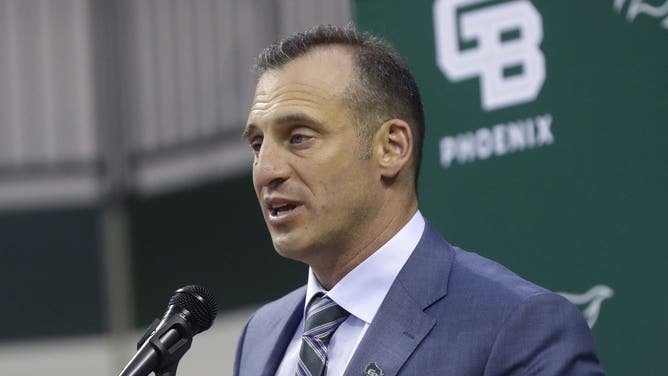 Green Bay head coach Doug Gottlieb speaks during a news conference.