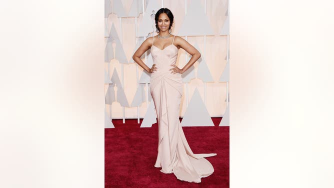 HOLLYWOOD, CA - FEBRUARY 22: Actress Zoe Saldana attends the 87th Annual Academy Awards at Hollywood & Highland Center on February 22, 2015 in Hollywood, California. (Photo by Jason Merritt/Getty Images)